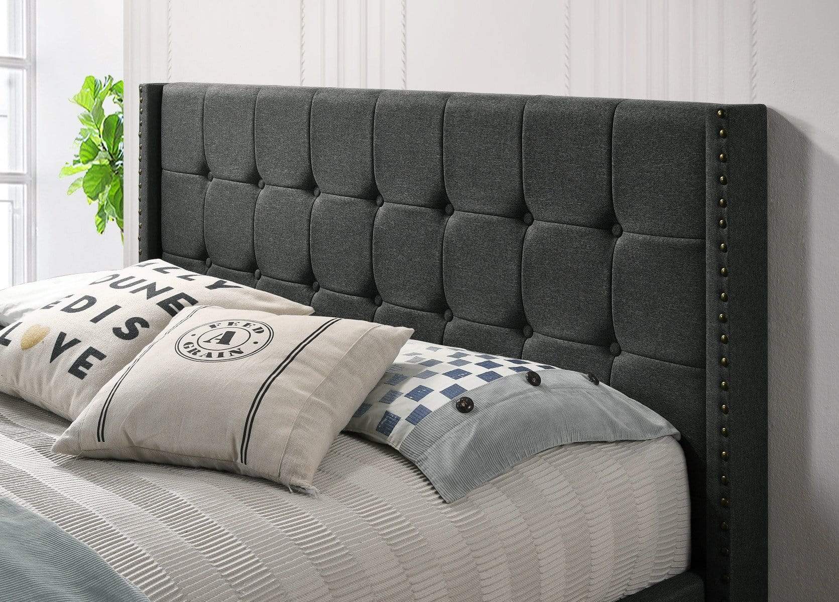 Queen Sized Winged Fabric Bed Frame with Gas Lift Storage in Charcoal - Newstart Furniture