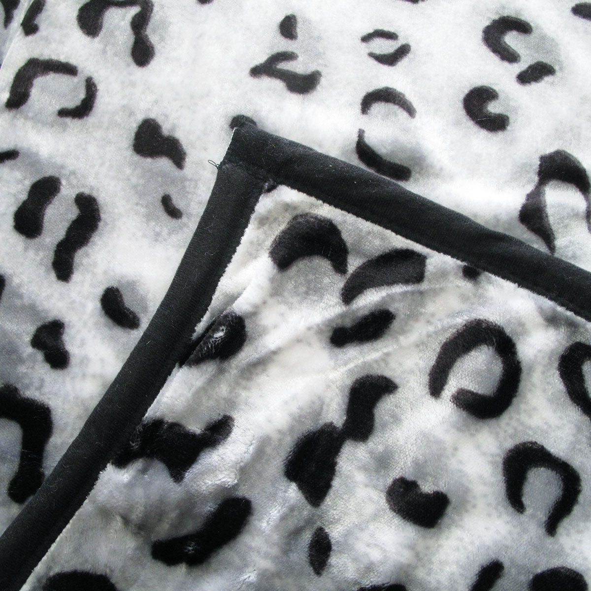 675gsm 2 Ply Animal Print Faux Mink Blanket Queen 200x240 cm Snow Leopard - Newstart Furniture